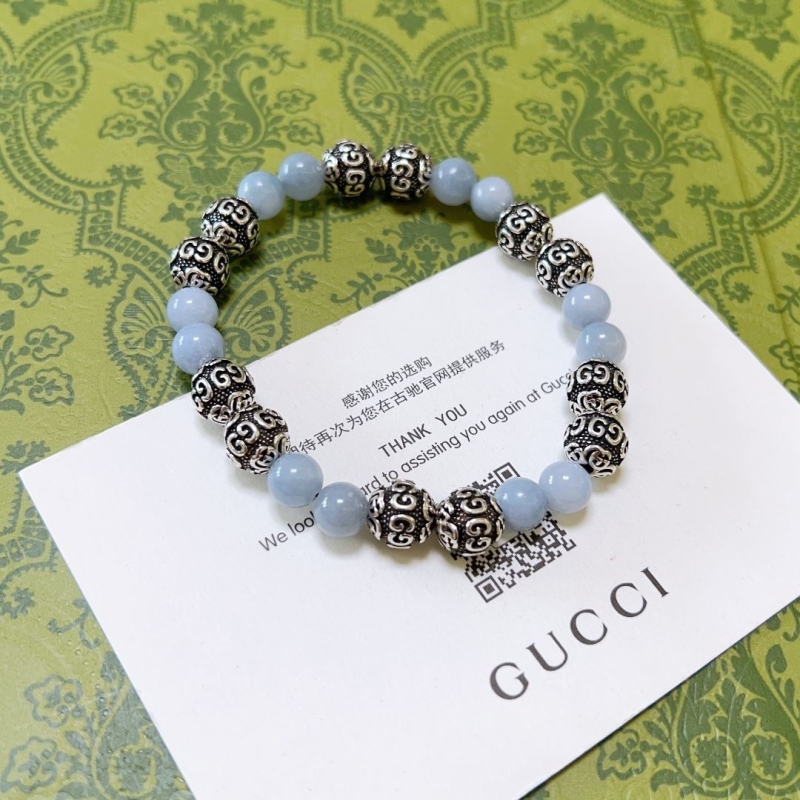 G*u*i bracelets